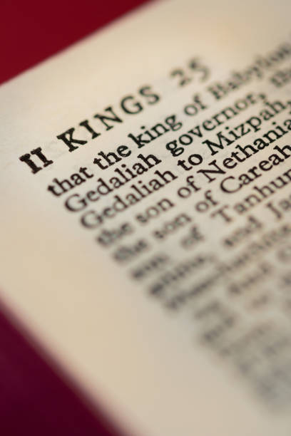 istock Close up macro image of a page from the bible showing a page header from ‘II Kings’ 1220550784