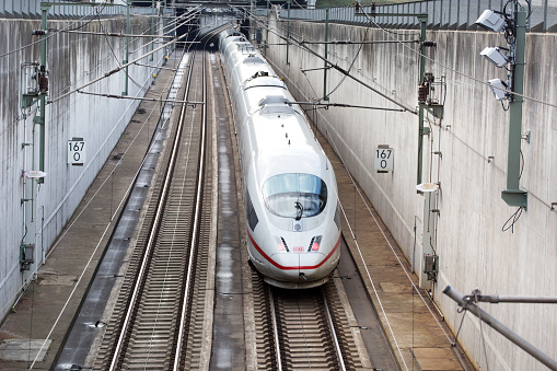 Kelsterbach, Germany - December 17, 2019: German highspeed train (ICE) on the Frankfurt–Cologne high-speed rail line. ICE, formerly known as InterCityExpress is a highspeed train system in Germany.
