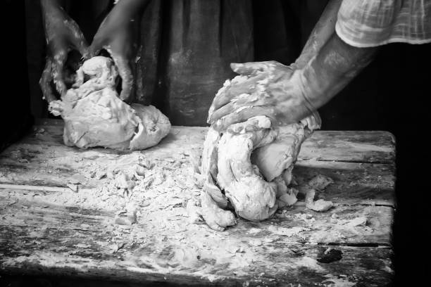Man kneading bread