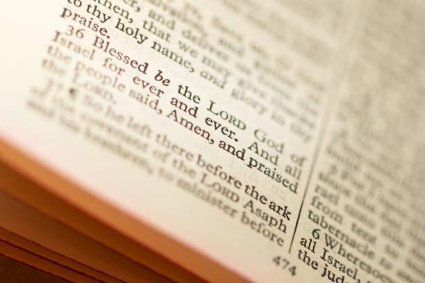 istock Close up abstract macro image showing pages from the bible. 1220551400