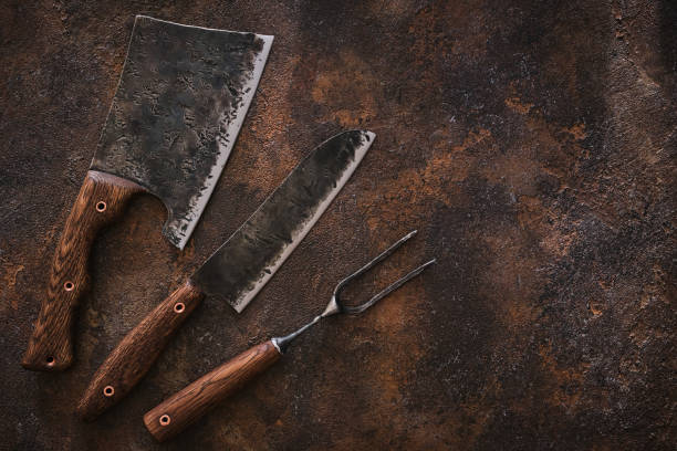 istock Stylish Butcher's Set: cleaver, knife and fork. Top view 1220551584