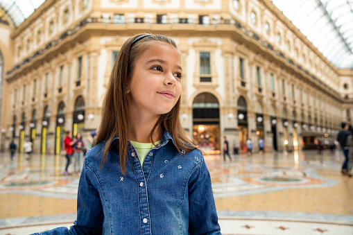 Tourist cute little girl in Milan