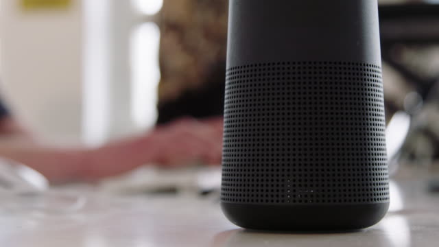 Smart speaker device on desk