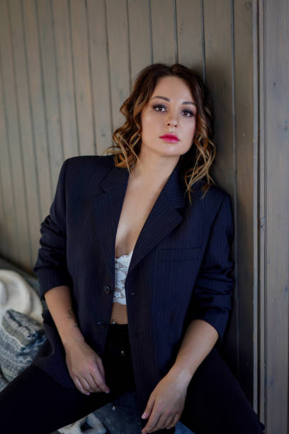 istock Beautiful woman in a man's jacket 1220555509