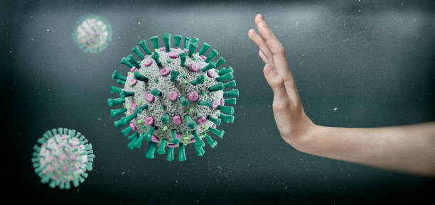 istock Human hand stopping COVID-19 Corona Virus 1220558376