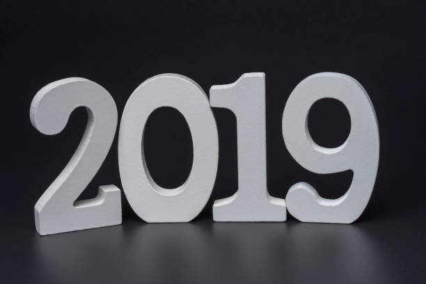 istock New year two thousand nineteen, white numbers on a black background. 1220560569