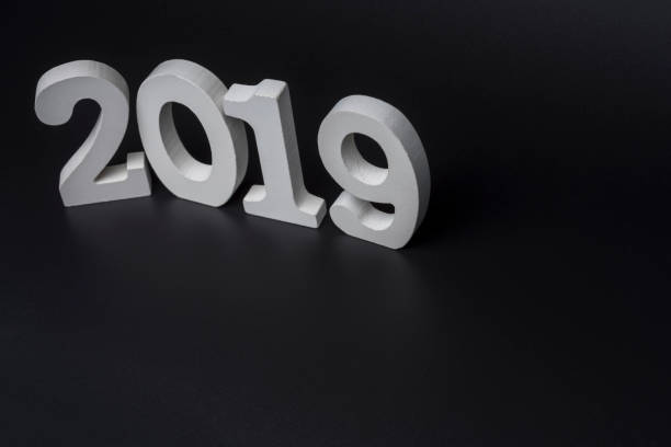 istock New year two thousand nineteen, white numbers on a black background. 1220561737