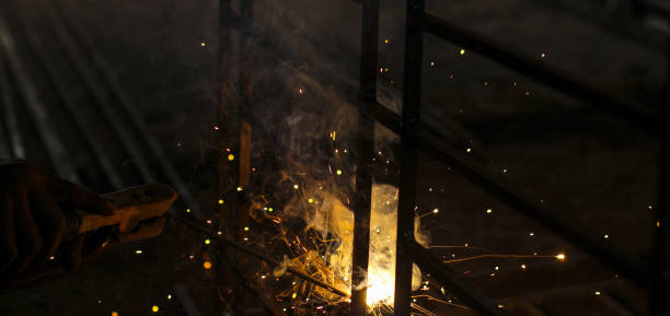 istock Metal welding. Sparks from electric heating. Iron, materials.Artistic welding sparks light, industrial background . 1220566439