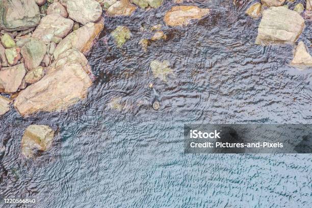 Vertical View To Water Surface From Mizen Head Pedastrian Bridge Stock Photo - Download Image Now