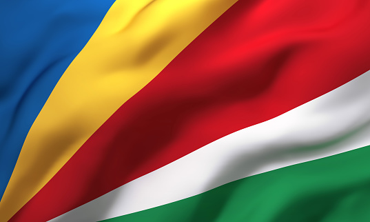 Flag of Seychelles blowing in the wind. Full page Seychellois flying flag. 3D illustration.