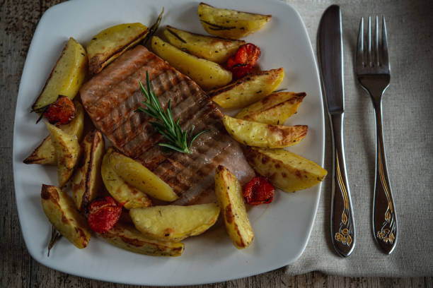 istock Grilled salmon with potatoes 1220570641