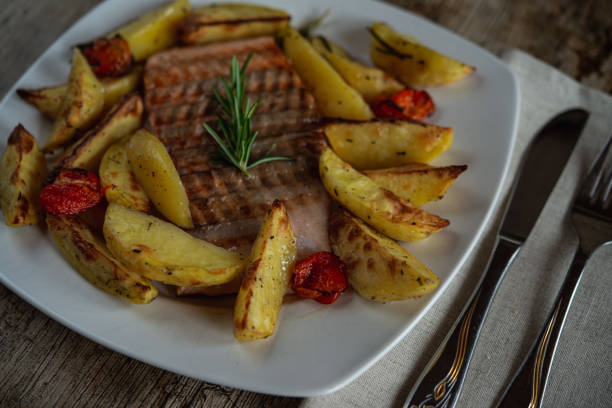 istock Grilled salmon with potatoes 1220570741
