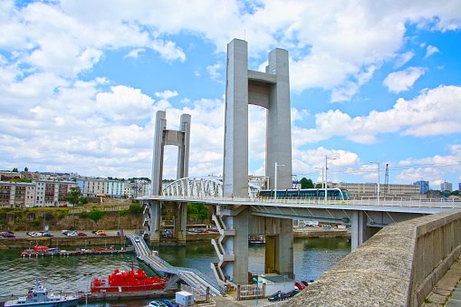 The Pont de Recouvrance is a vertical-lift bridge in Brest, France, across the river Penfeld. Opened on 17 July 1954, it was the largest vertical-lift bridge in Europe until the opening of the Rouen Pont Gustave-Flaubert in 2008.