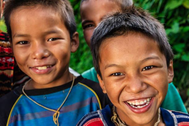 istock Happy Nepali boys near Annapurna Range 1220572286