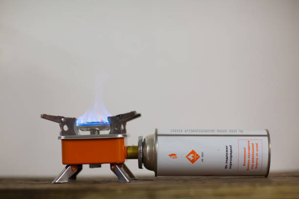 istock Camping tourist burner and gas cylinder 1220573554