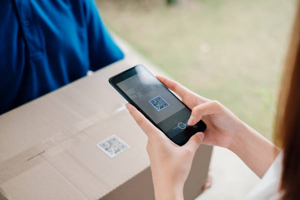 istock QR Code Scaning door to door delivery express sending send a package to customer receiver sign with smartphone checking shipping paying deliver cargo business occupation transportation shopping online 1220573907