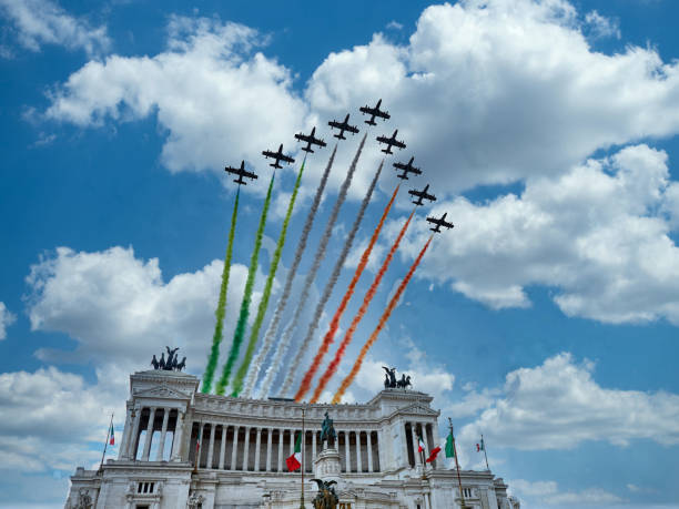Italian National Republic day Air show aerobatic team frecce tricolore flying over altare della patria in Rome, Italy Italian National Republic day Air show aerobatic team frecce tricolore flying over altare della patria in Rome, Italy airshow photos stock pictures, royalty-free photos & images