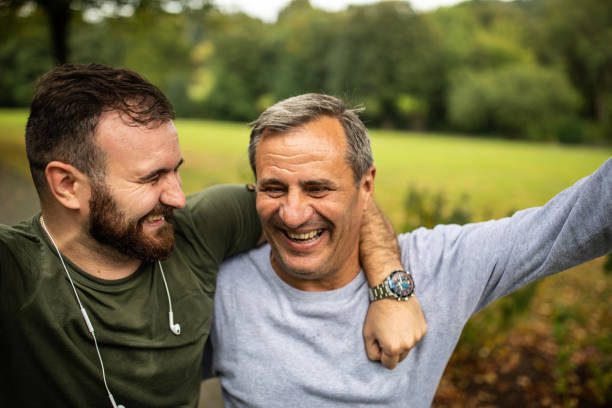 istock Son enjoying active morning at public park with his father 1220575586