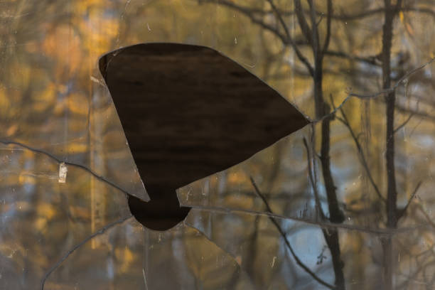 istock Broken window in abandoned ghost town Pripyat in Chernobyl zone 1220576645