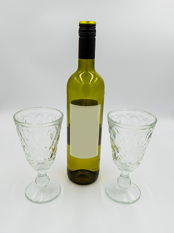 Wine bottle and glasses with empty label for self design