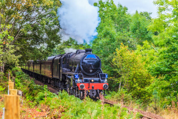 istock Steam train passes through Scottish Highlands 1220577291