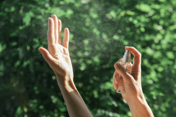istock Hands spray. Antibacterial spray for hands. Woman spray hands sanitizer for preventive coronavirus spread. Epidemic prevention, disinfection, skin care concept. 1220579143