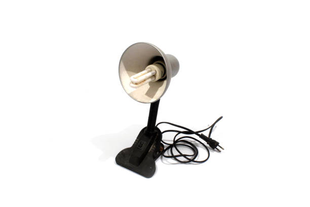 istock Table Lamp with a clothespin on a white background 1220581030