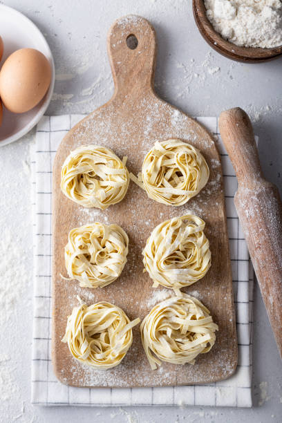 istock Uncooked homemade pasta tagliatelle 1220581615