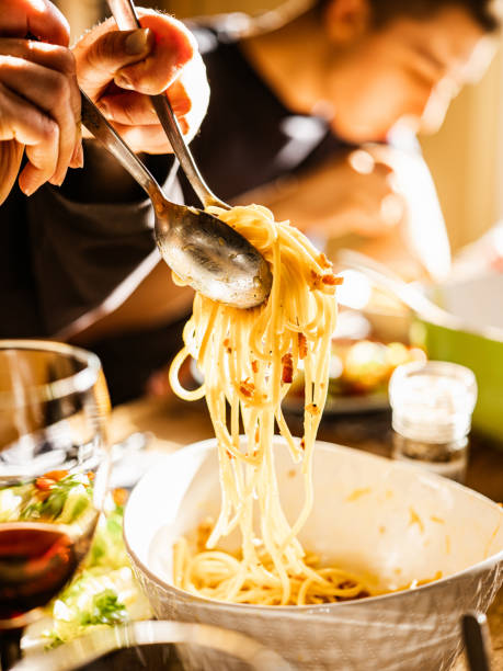 istock Eating Carbonara Italian style lunch 1220582698