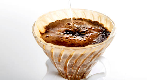 istock Sipping coffee on a paper colander 1220583147