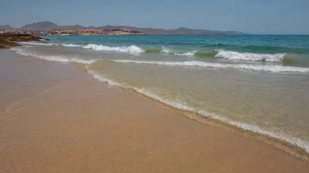 Costa Calma, a shallow-water pristine beach in the south-eastern part of the island, delighting tourists with great swimming and water sports opportunities, in Fuerteventura, Canary Islands, Spain.