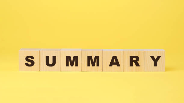 istock summary inscription on wooden blocks on yellow background 1220583616