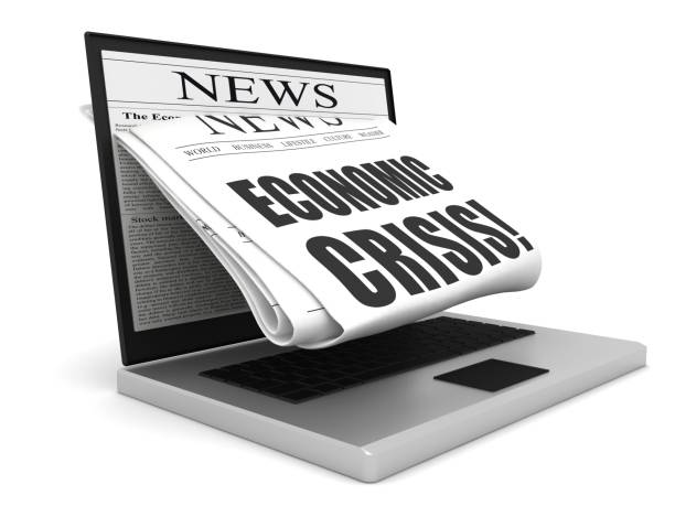 istock Crisis newspaper laptop 1220586523