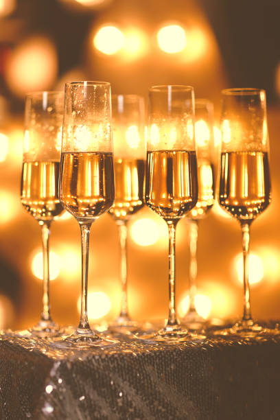 istock Goblets of champagne during party 1220589554