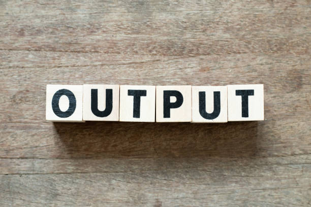 istock Letter block in word output on wood background 1220590505