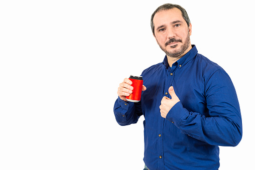 40s man holding tin can with soda on white background