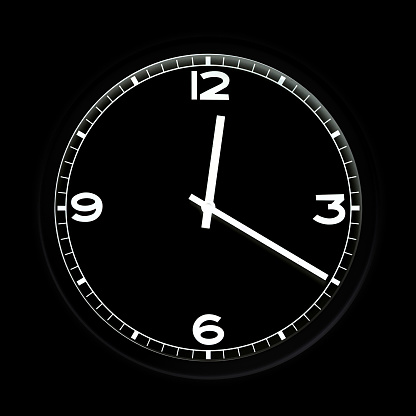 Round clock on black background. Time concept.