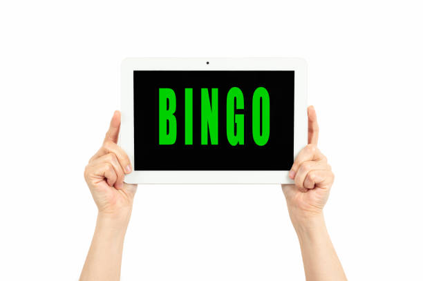 hands holding tablet with the word bingo - video game pc sign portable information device imagens e fotografias de stock