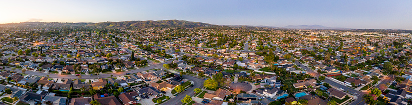 California suburbs at night from a drone point of view.