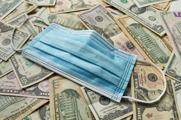 istock American dollars in banknotes scattered on the table 1220600678