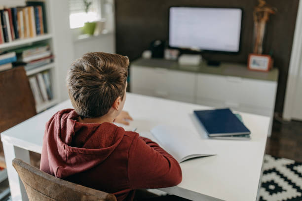 istock Teenager learning through TV broadcasting 1220600684