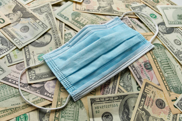 istock American dollars in banknotes scattered on the table 1220600726