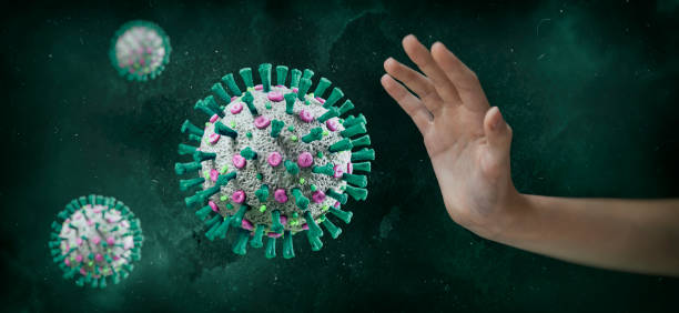 istock Human hand stopping COVID-19 Corona Virus 1220603402