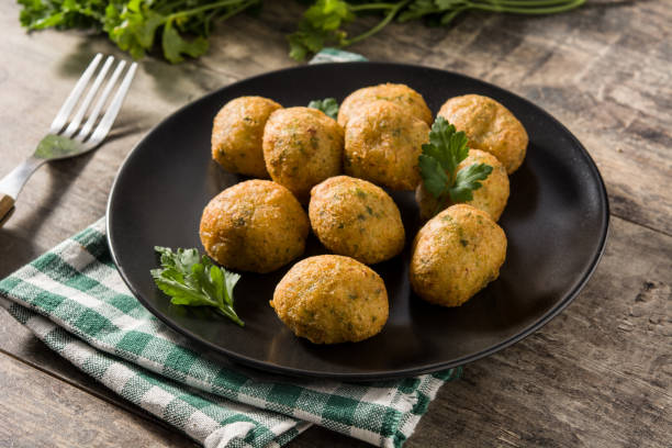 istock Traditional cod fritters with garlic and parsley 1220605603