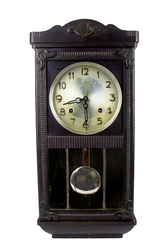antique black pendulum  wall clock on white background