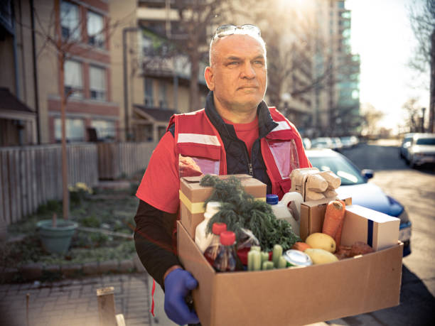 istock COVID-19, Donation Home food delivery during lockdown 1220607842