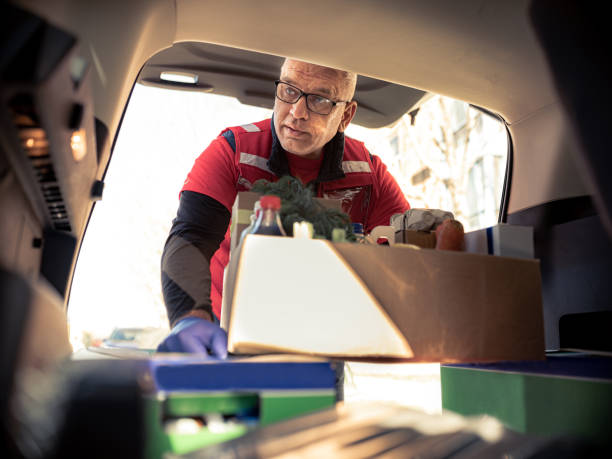 istock COVID-19, Donation Home food delivery during lockdown 1220608444