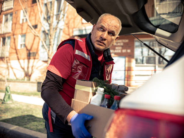 istock COVID-19, Donation Home food delivery during lockdown 1220608473