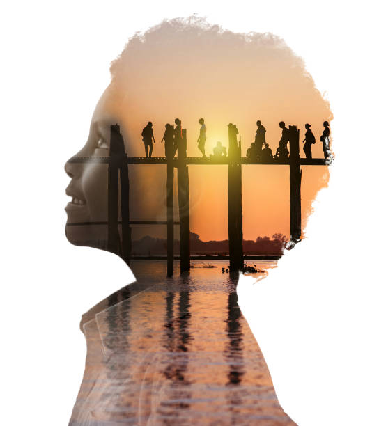 Double exposure of a boy from Myanmar thinking about the U Bein bridge
