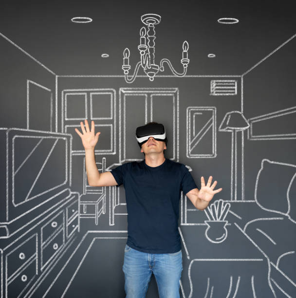 istock Conceptual image of a man trying a virtual reality simulator 1220610095